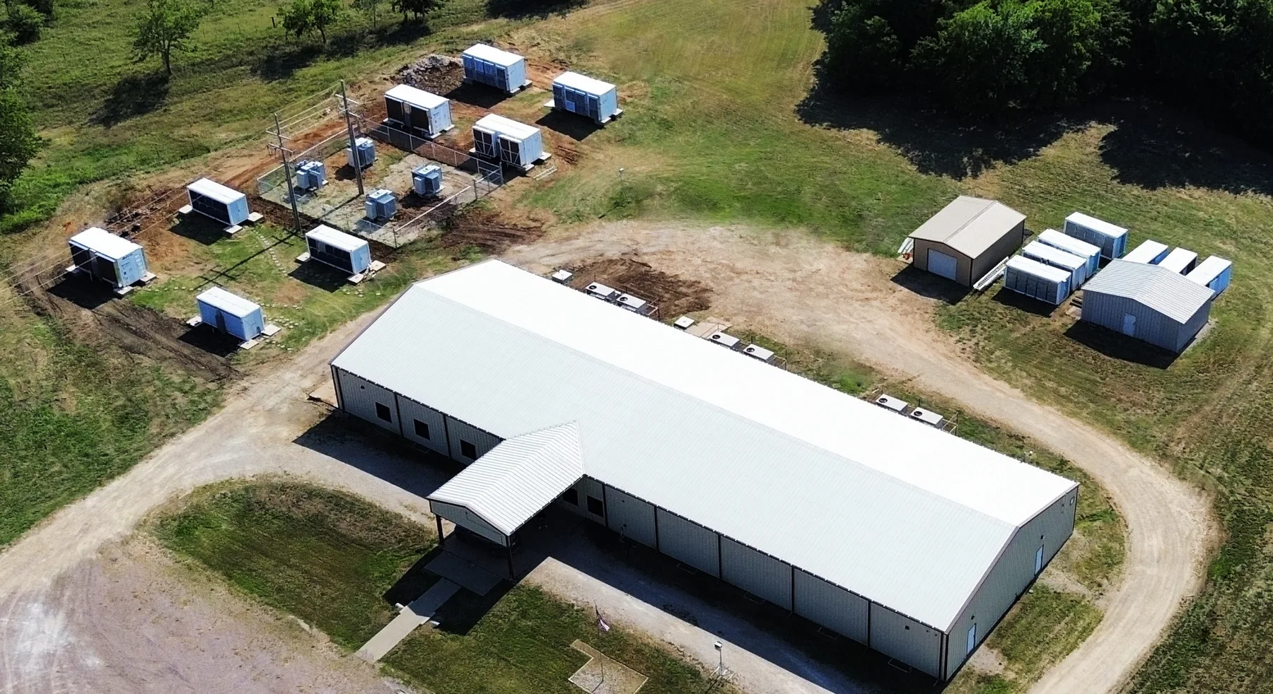 Atlantic facility campus with buildings, containers, and service roads