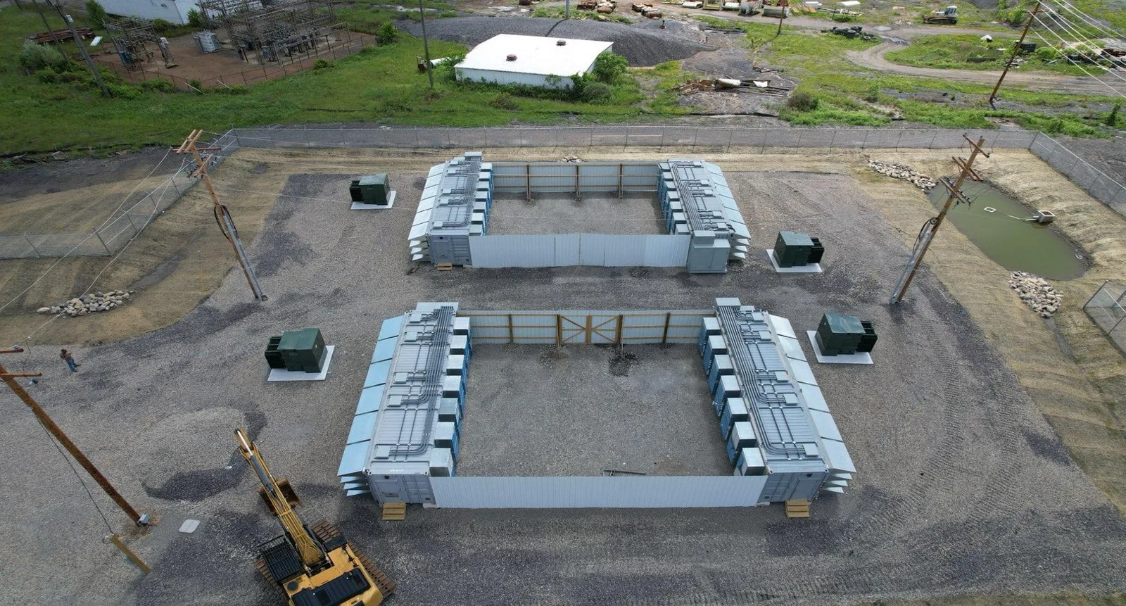 Containerized compute units arranged in a fenced Atlantic facility